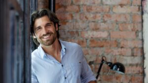 Handsome man with beard smiling